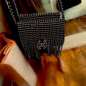 Chanel bifold fringe cross body.